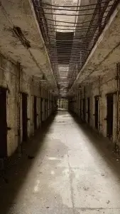 Holmesburg Prison decaying dim corridor