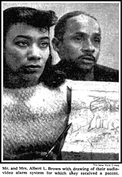 Marie van Brittan Brown and husband holding patent paperwork